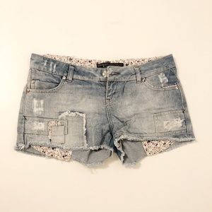 Jean shorts with floral details